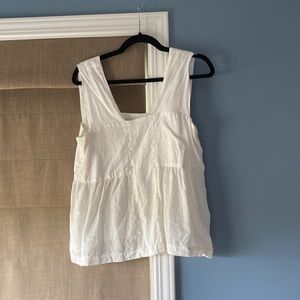 White linen amour vert sleeveless top.